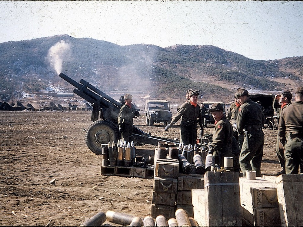 Howitzers firing.jpg